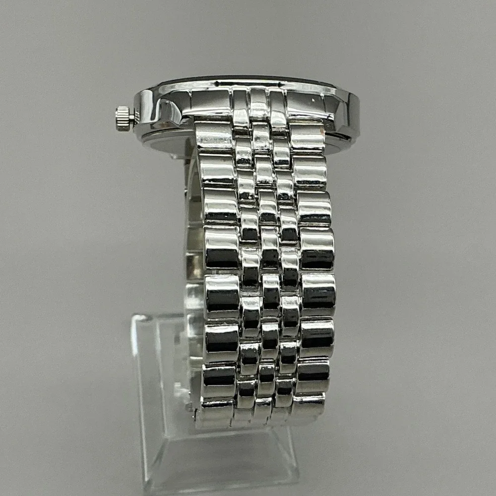 Bob Mackie Womens Watch Silver Dial Silver Tone Bracelet Quartz Analog BMS4010SS